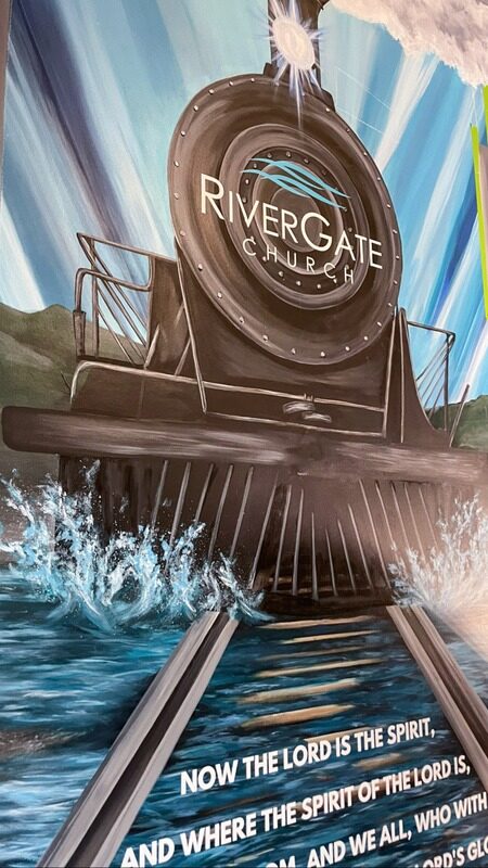Detail of the finished mural lettering and locomotive